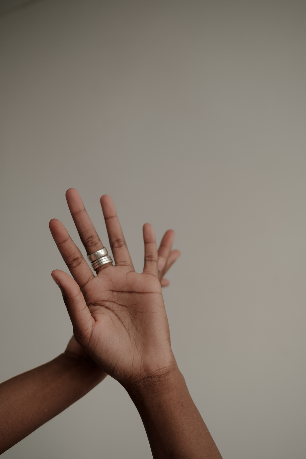 Woman's Hands Raised